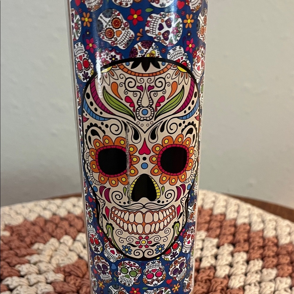 Vibrant Sugar Skull Candle with Blue Floral Design - Picture 2 of 7